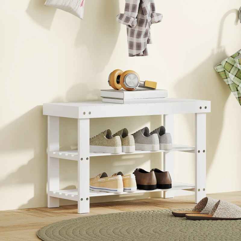banc d'entrée avec chaussures et livres 