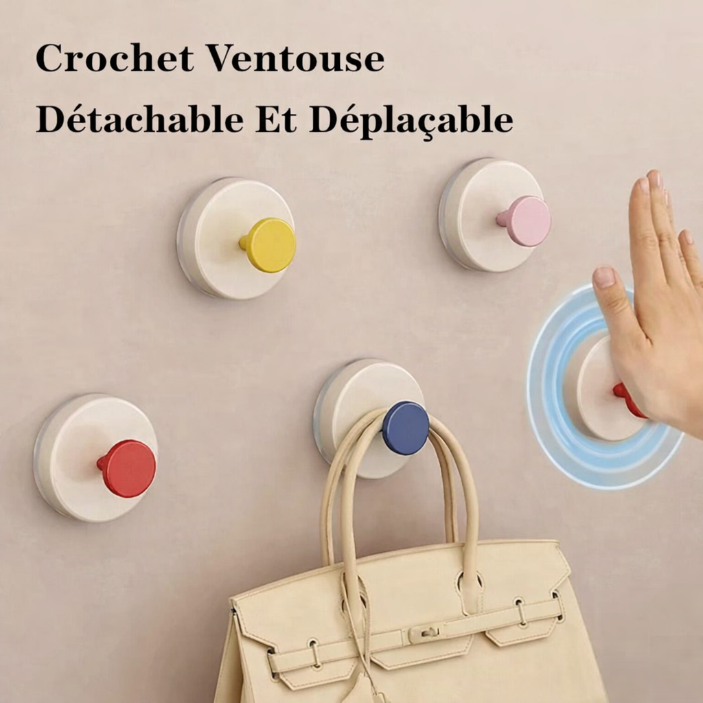 Main qui place un crochet muraux