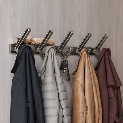 Patère porte manteau avec manteaux suspendus dans une entrée