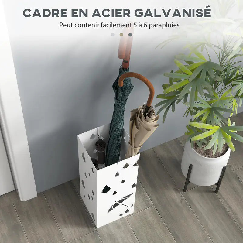 Un porte parapluie blanc dans une entrée avec parapluies à l'intérieur dans un joie décor