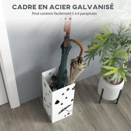 Un porte parapluie blanc dans une entrée avec parapluies à l'intérieur dans un joie décor